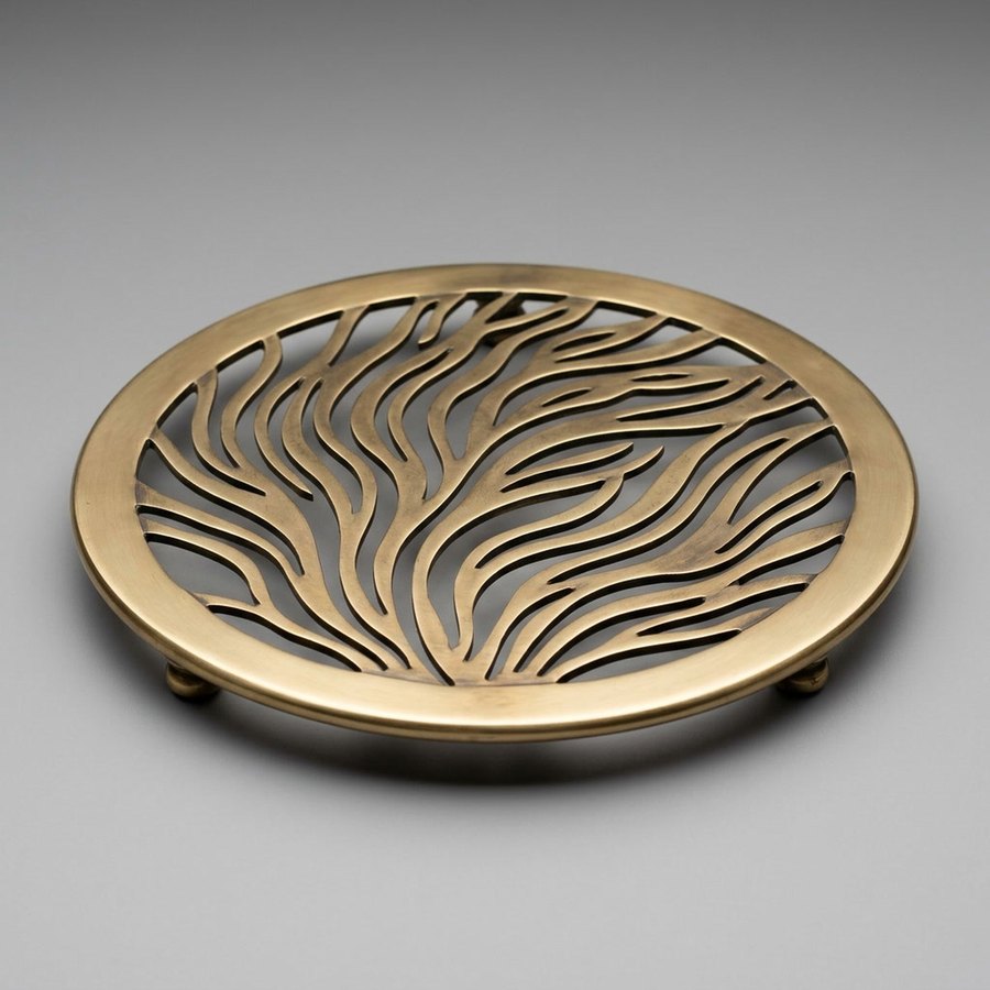 Seaweed Trivet — Pierced solid brass · Antique brass