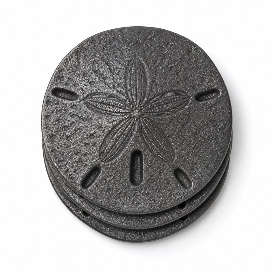Dollar Coasters — Cast Metal · hand-forged dark charcoal cast metal