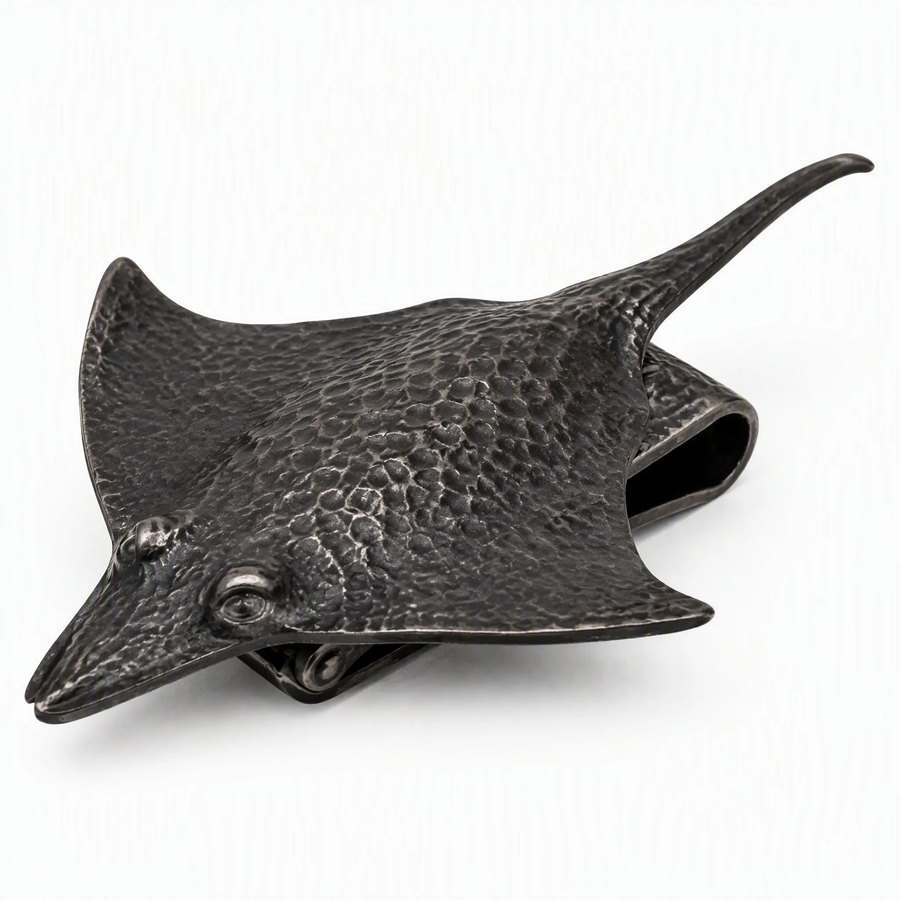 Stingray Money Clip — Cast Metal · hand-forged dark charcoal cast metal