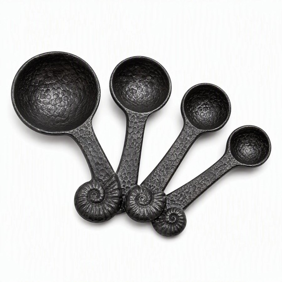 Nautilus Measuring Spoons — Cast Metal · hand-forged dark charcoal cast metal