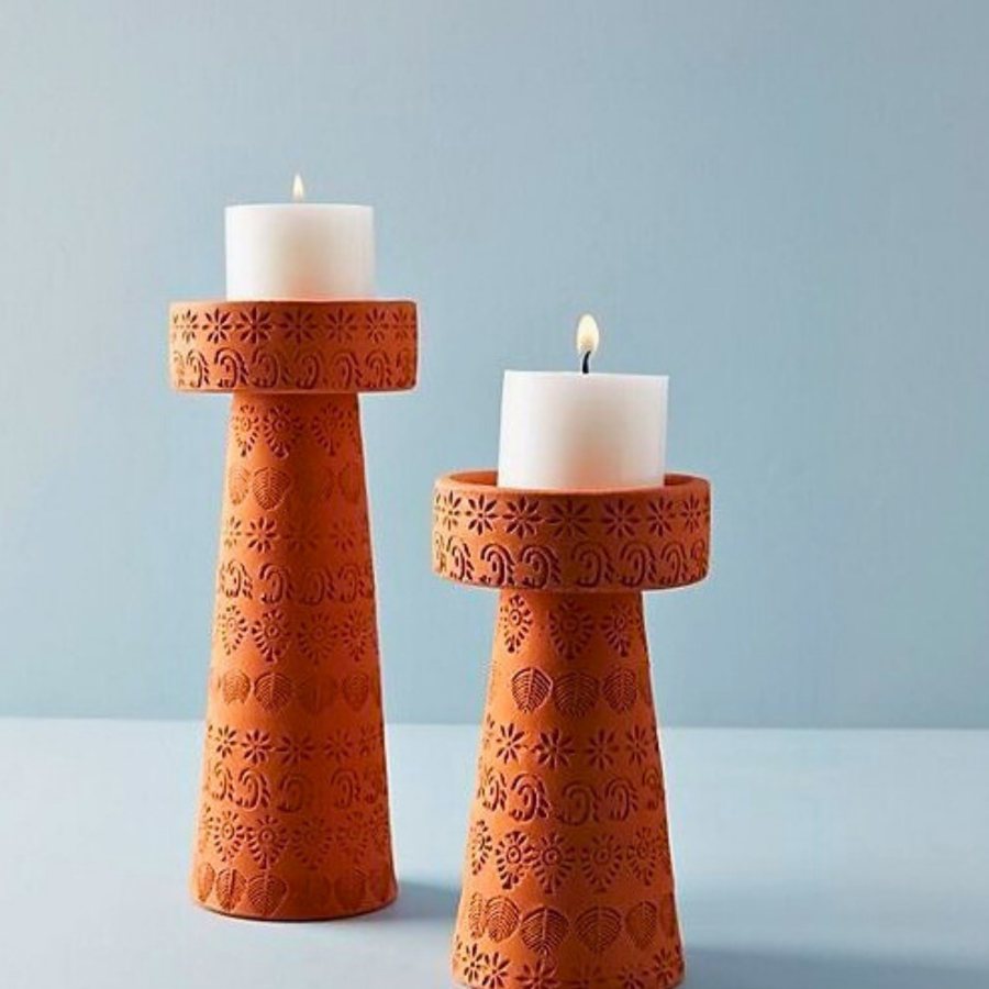 Carved Pillar Candle Stand — Terracotta · all-over carved relief · pair