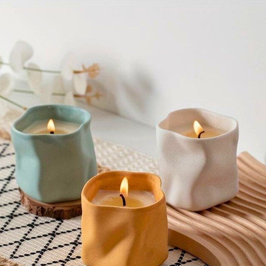 Organic Wave Candle Vessel — Ceramic · organic pinched wall · pastel glaze