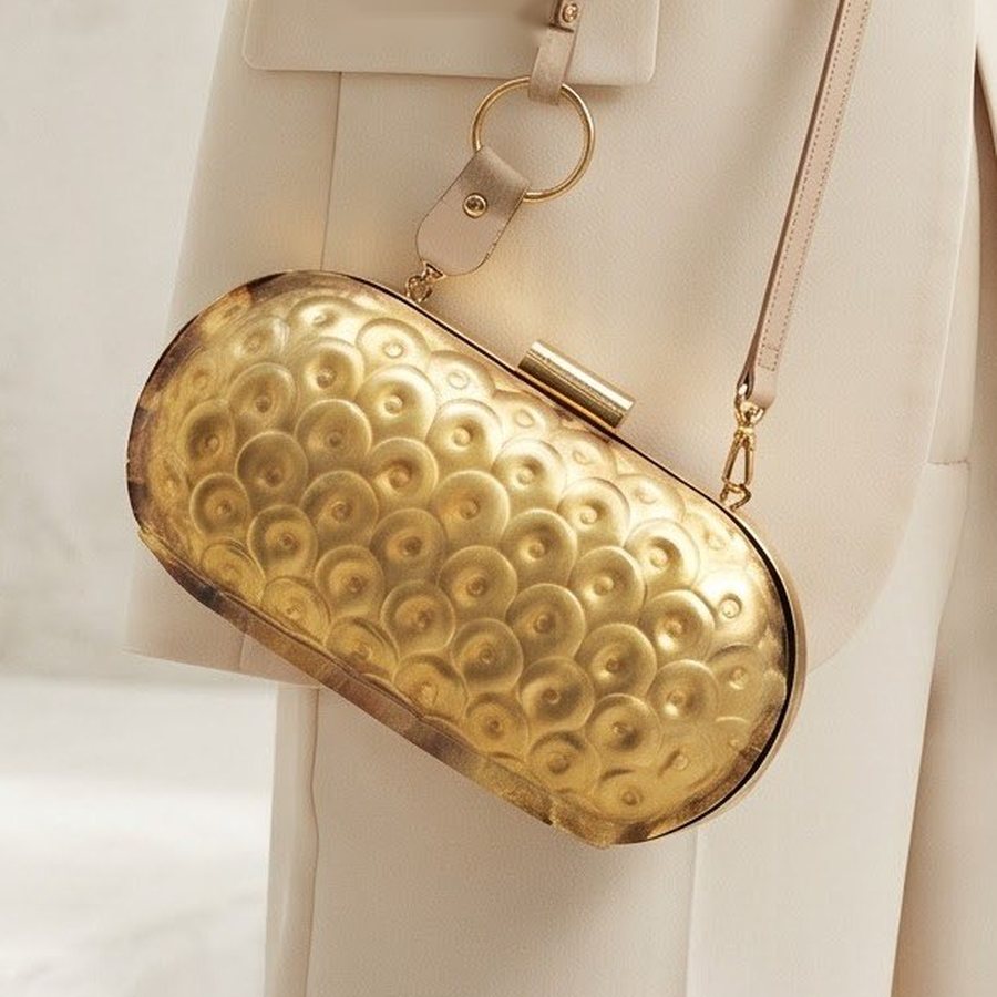 The Cocoon Handbag — Hand-worked metal · polished gold-tone