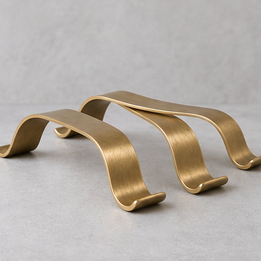 Citrus Rib Dish Riser — Brass with four small wood underside pads · natural honey brass · concept render