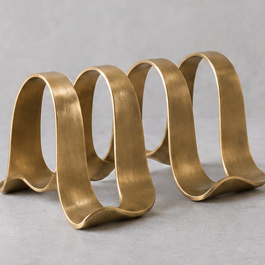 Seedfold Toast Rack — Brass · natural honey brass · concept render