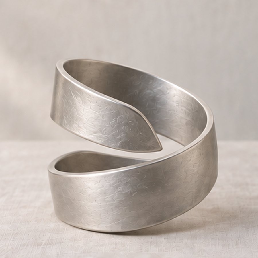 Twist-Ribbon Napkin Cuff — Aluminium · natural silver aluminium · concept render
