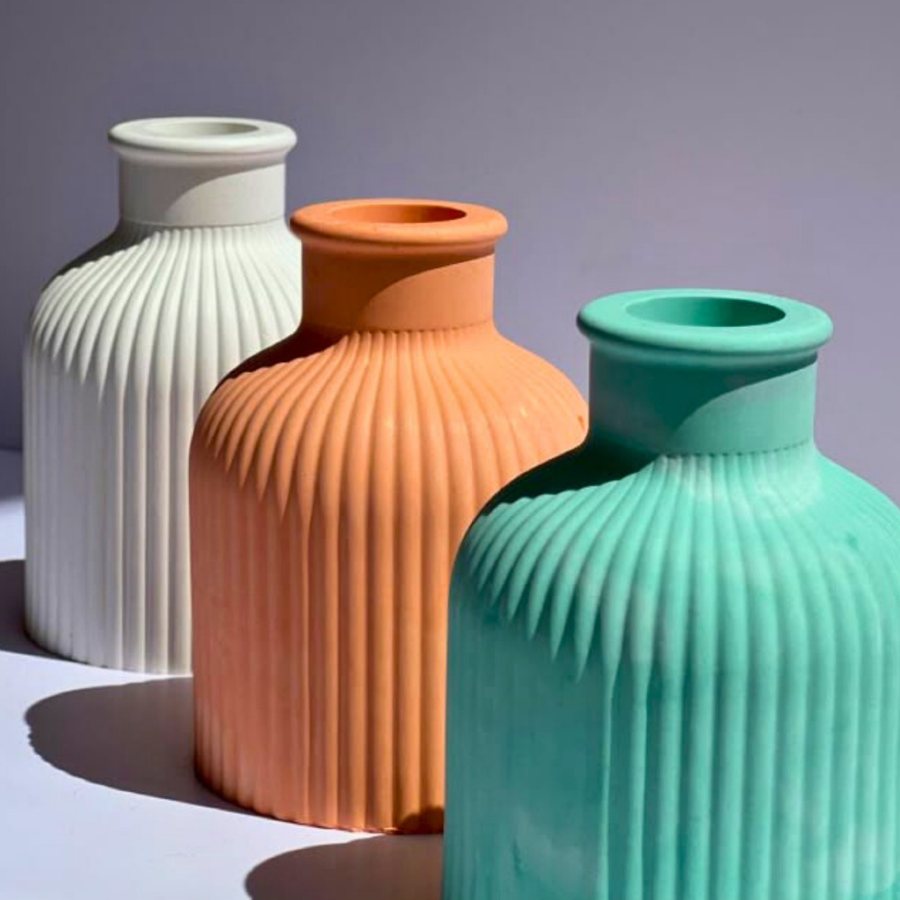 Ribbed Bottle Vase — Ceramic · fluted body · colour range