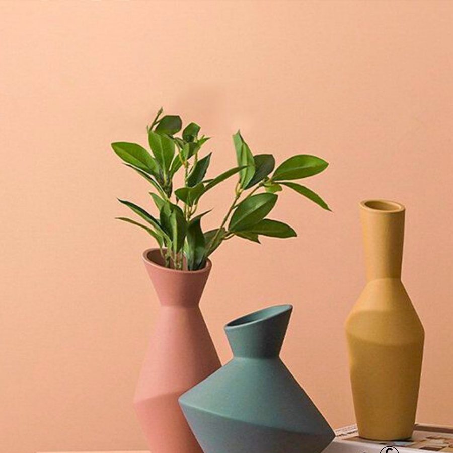 Faceted Geometric Vase — Ceramic · faceted planes · matte colour