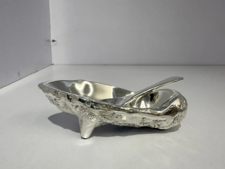 Mirror-polished silver oyster dish with matching spoon
