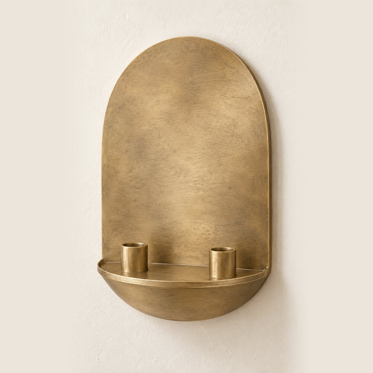 Twin Candle Arch, a broad antique brass wall sconce with a wide shelf for two taper candles, design render