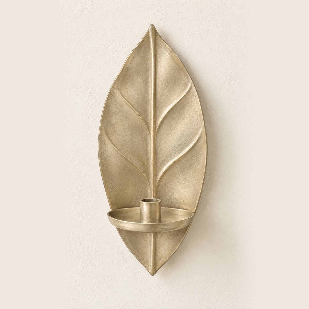 Soft Rib Leaf, a pale natural brass leaf-shaped wall sconce with hand-chased veins, design render