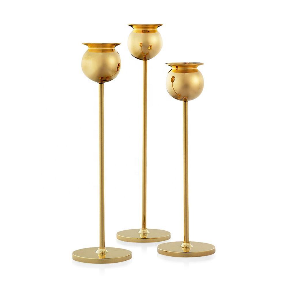 Metal candle holders and candelabra